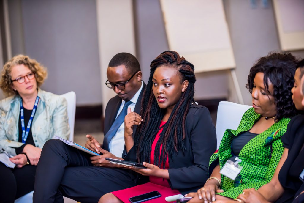 An Oxford Policy Fellow presenting to law and public policy professionals
